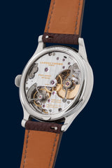 Laurent Ferrier – Pièce unique en acier, cadran saumon serti de saphirs et de rubis